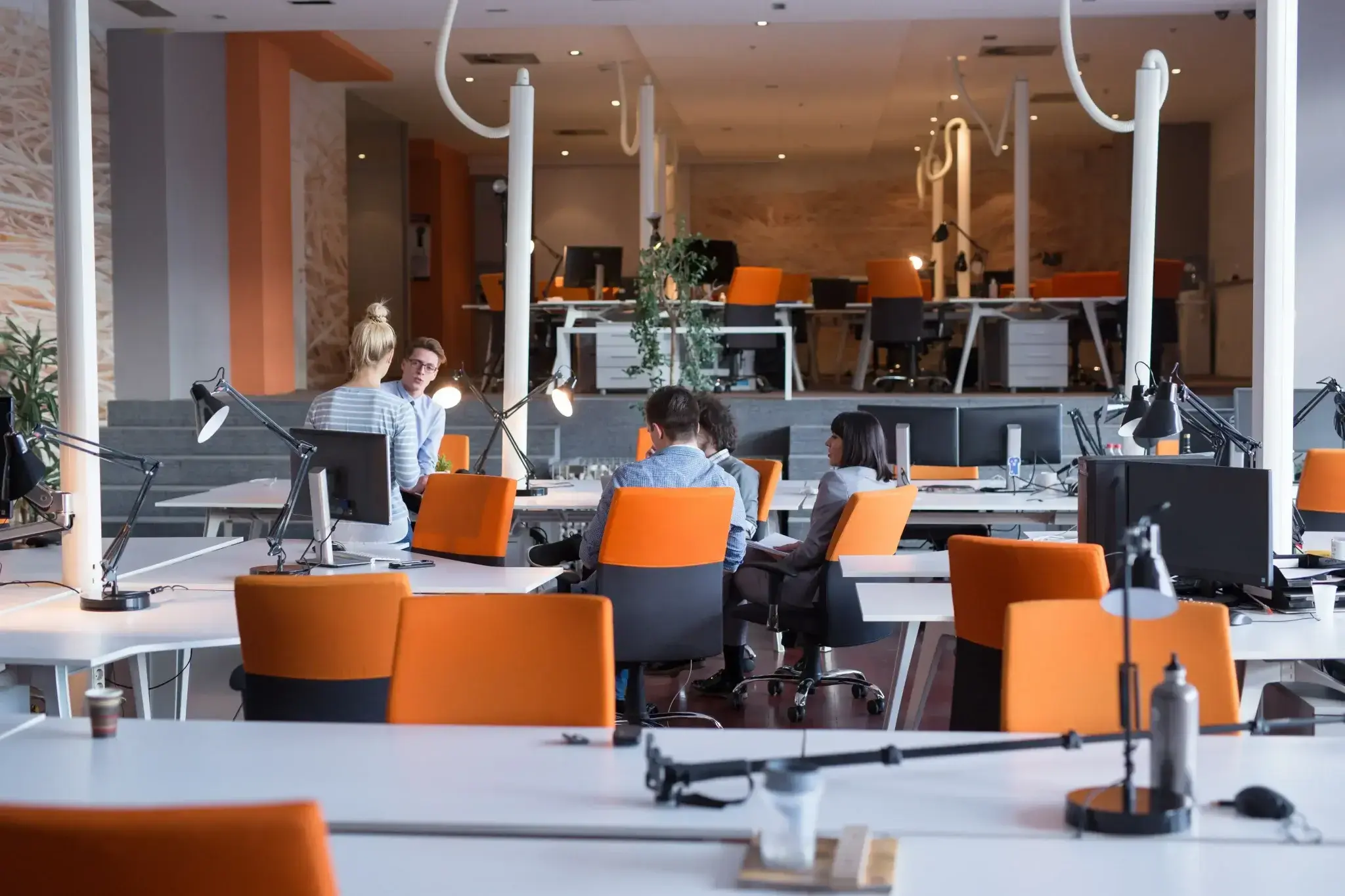 group-young-business-people-discussing-business-plan-office1-2048x1365